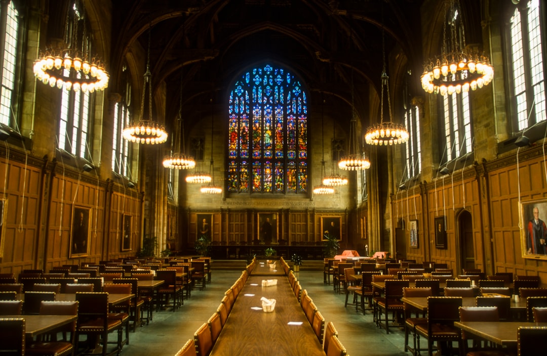 brown wooden chairs inside cathedral