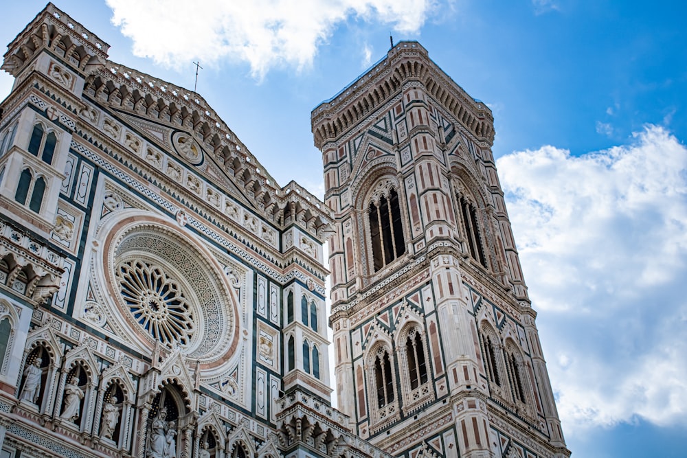 a large cathedral with a clock on the front of it