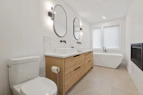 white ceramic sink with stainless steel faucet