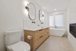 white ceramic sink with stainless steel faucet