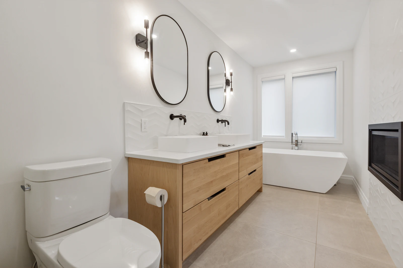 Bathroom with a wood vanity and white sink