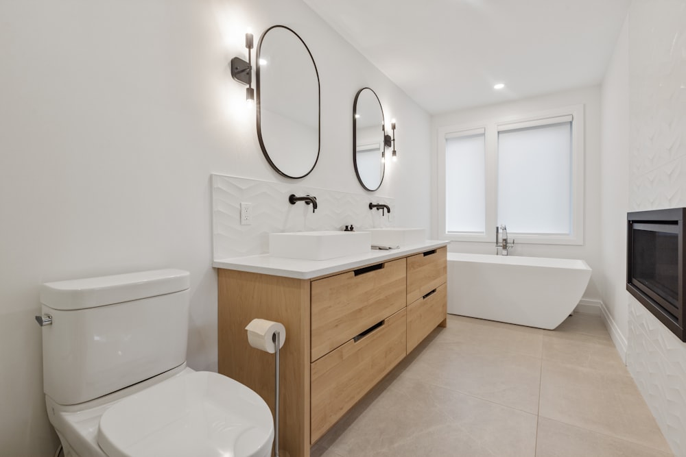 white ceramic sink with stainless steel faucet