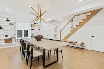 rectangular white table with chairs