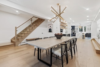 rectangular white table with chairs