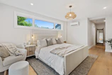 Elegant bedroom featuring voice-controlled lighting and temperature for ultimate relaxation.