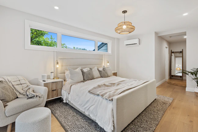 Elegant bedroom featuring voice-controlled lighting and temperature for ultimate relaxation.