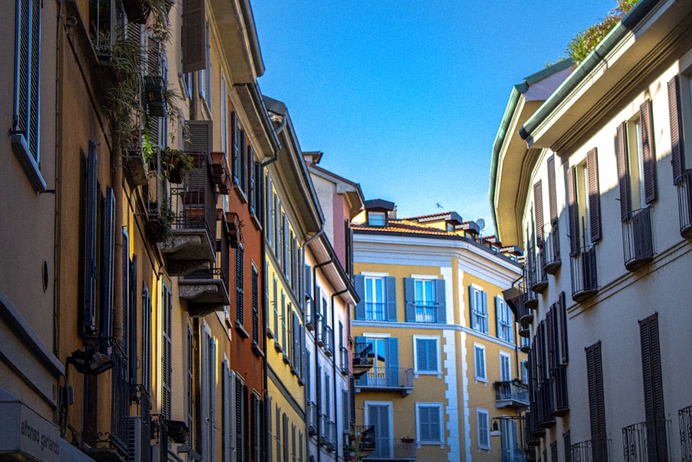 brown and white concrete buildings under blue sky during daytime