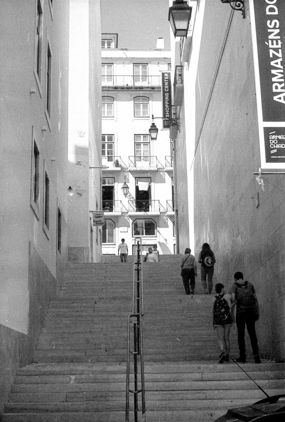 grayscale photo of people walking on street