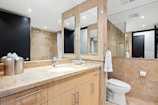 white ceramic sink near white ceramic sink