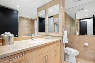 white ceramic sink near white ceramic sink