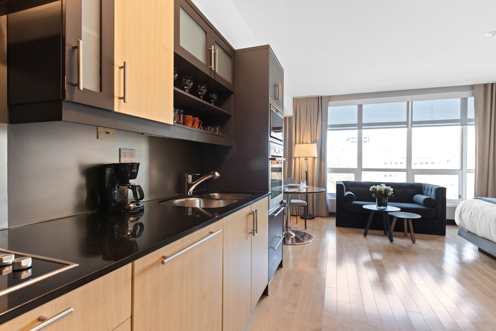 black and silver coffee maker on kitchen counter