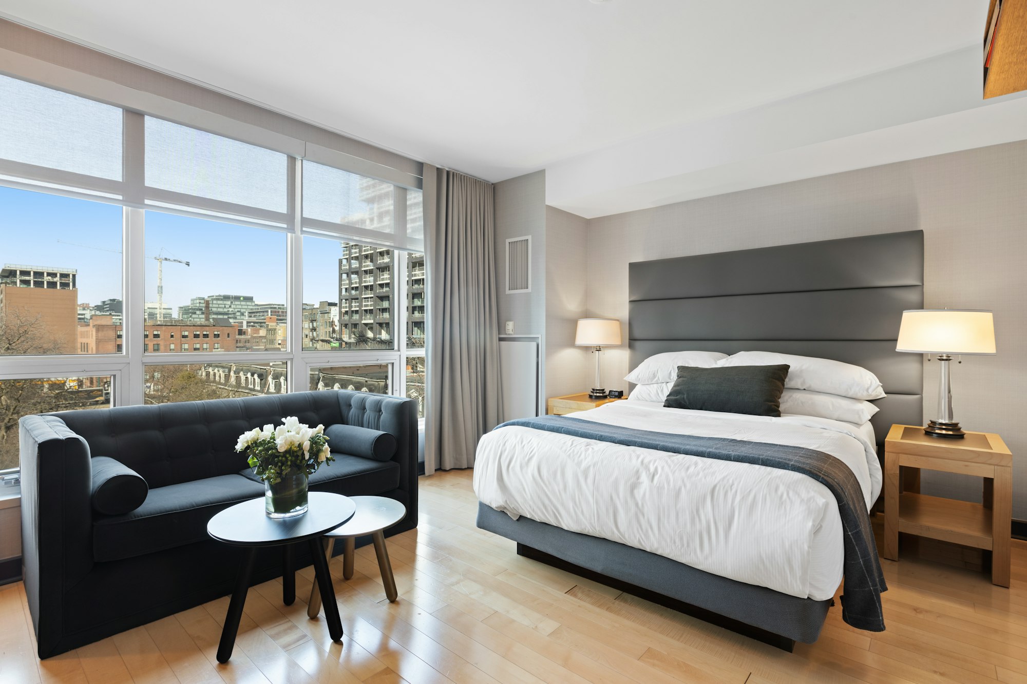 Luxury hotel room with couple in bathrobes
