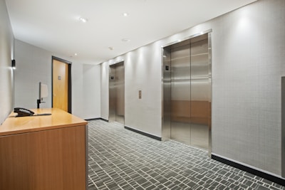 brown wooden cabinet near brown wooden door