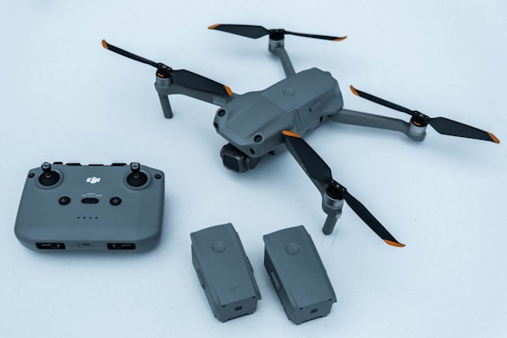 black and yellow drone with black iphone 4 s