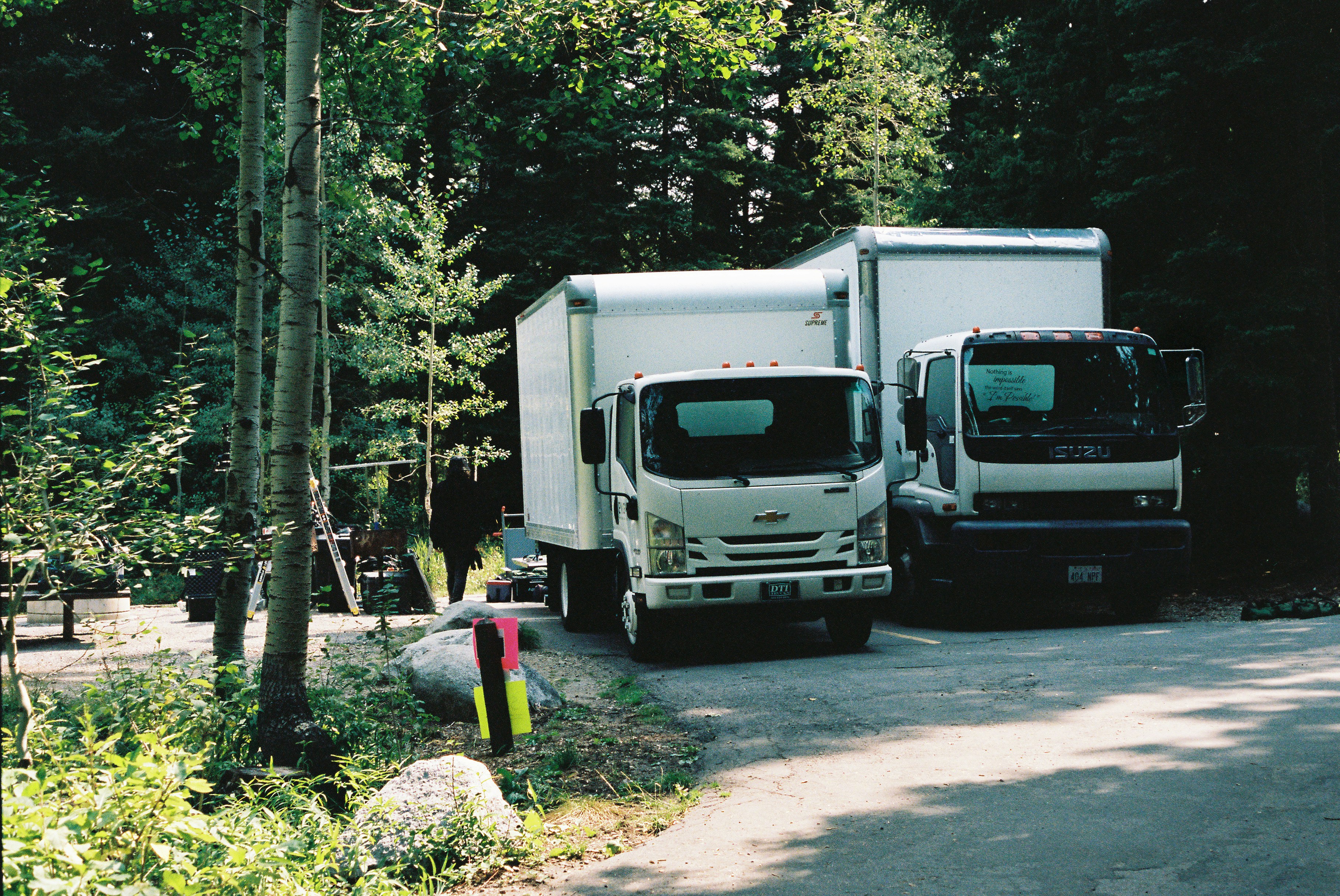 white and black truck on road during daytime