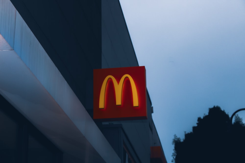 a close up of a mcdonald's sign on a building