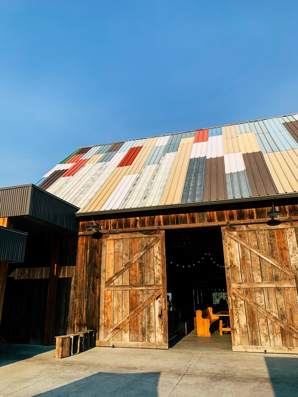 brown wooden house under blue sky during daytime