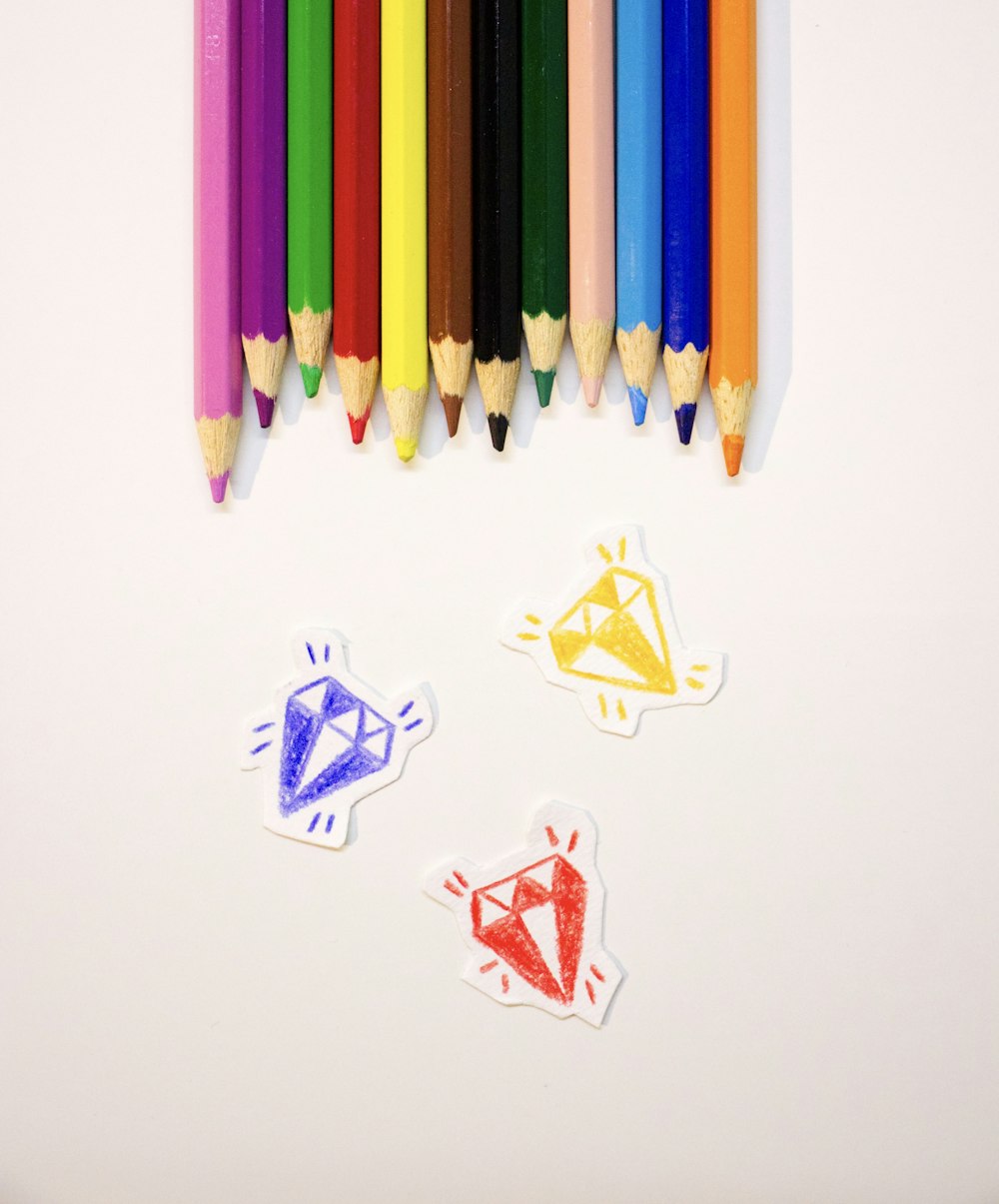 purple blue and yellow color pencils