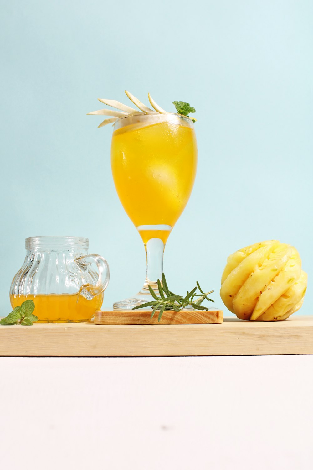 yellow fruit in clear glass vase