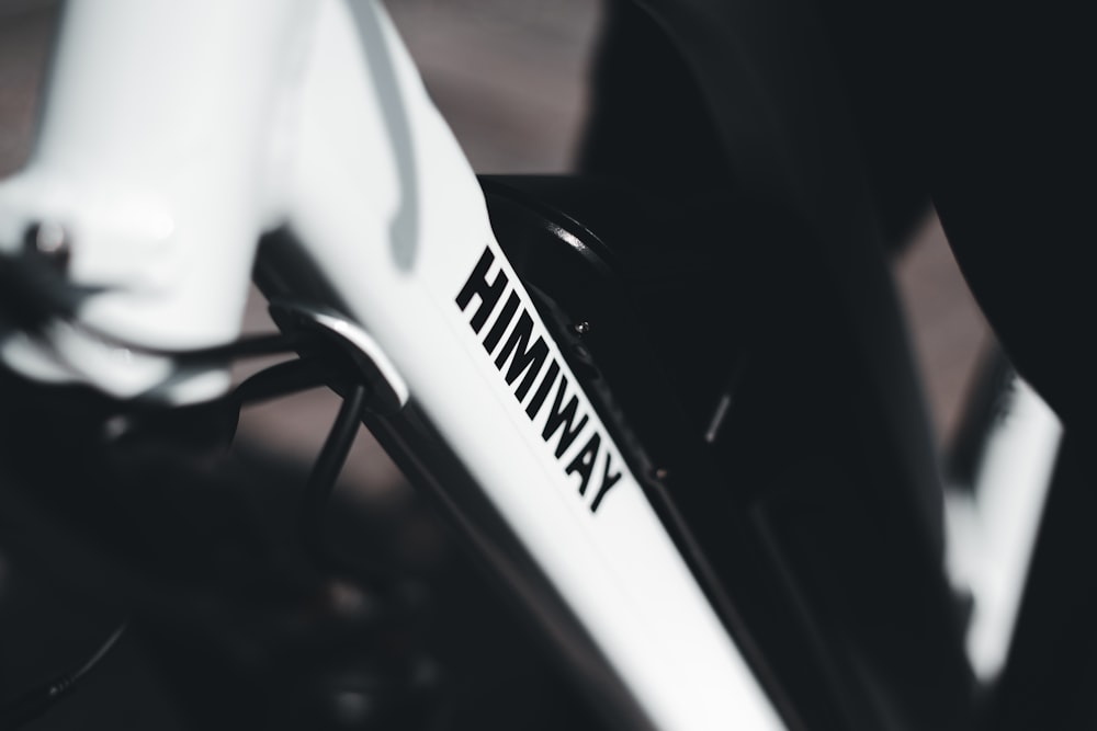 white and black bicycle handle bar