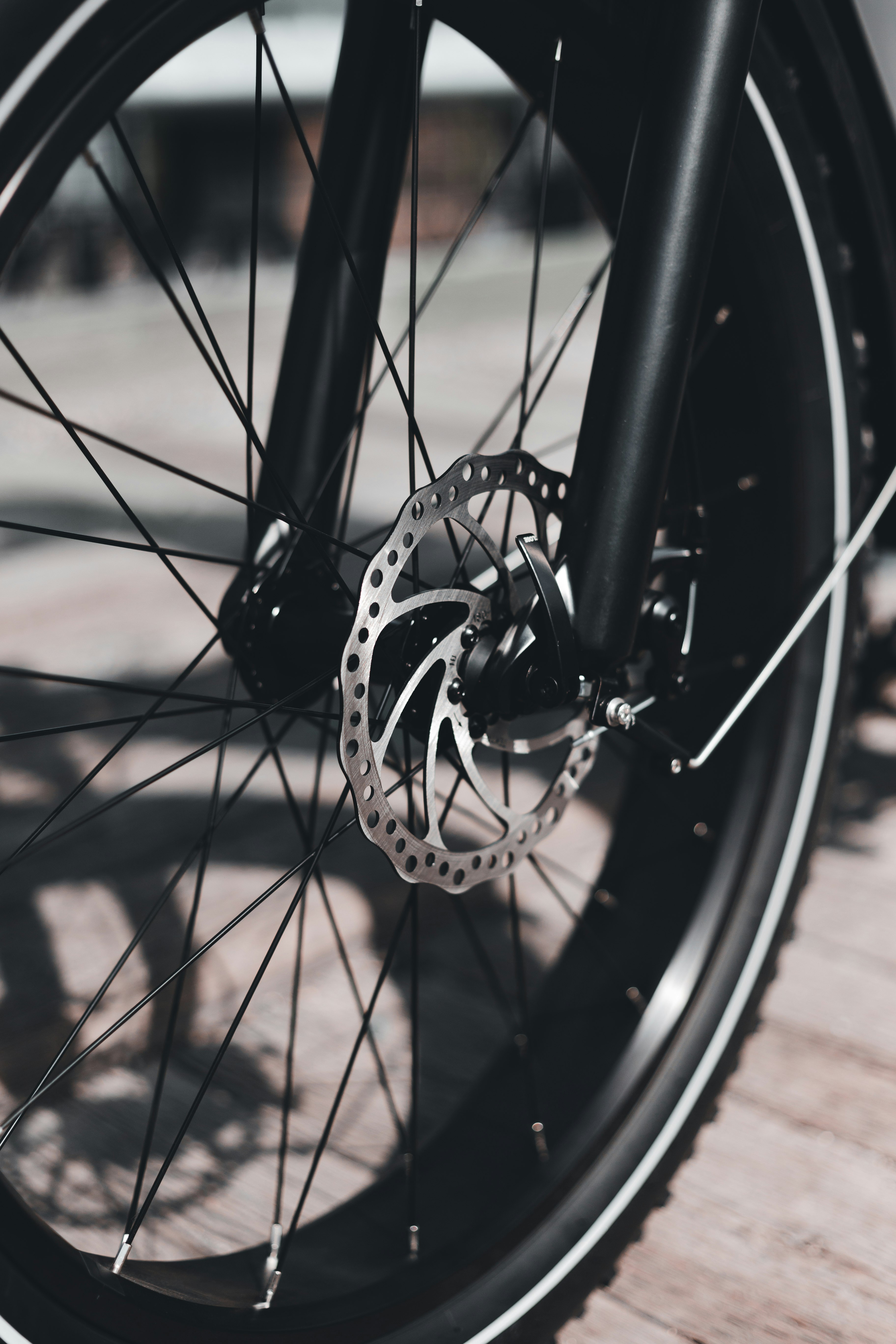 black and silver bicycle wheel