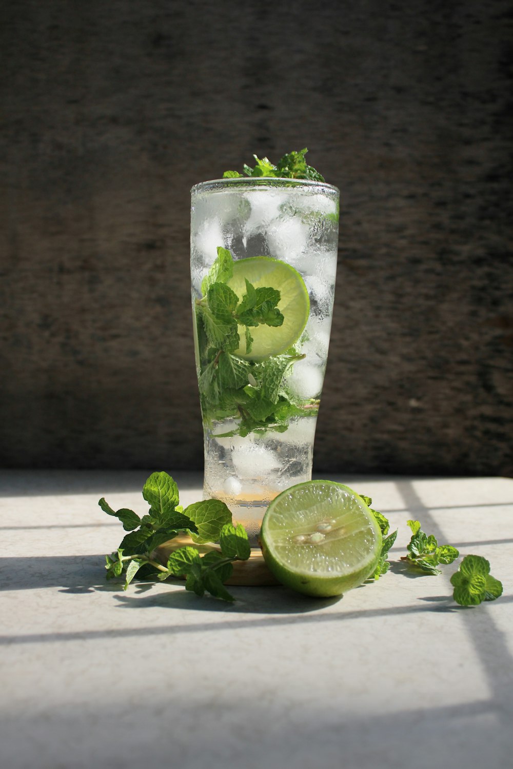 clear drinking glass with sliced lemon