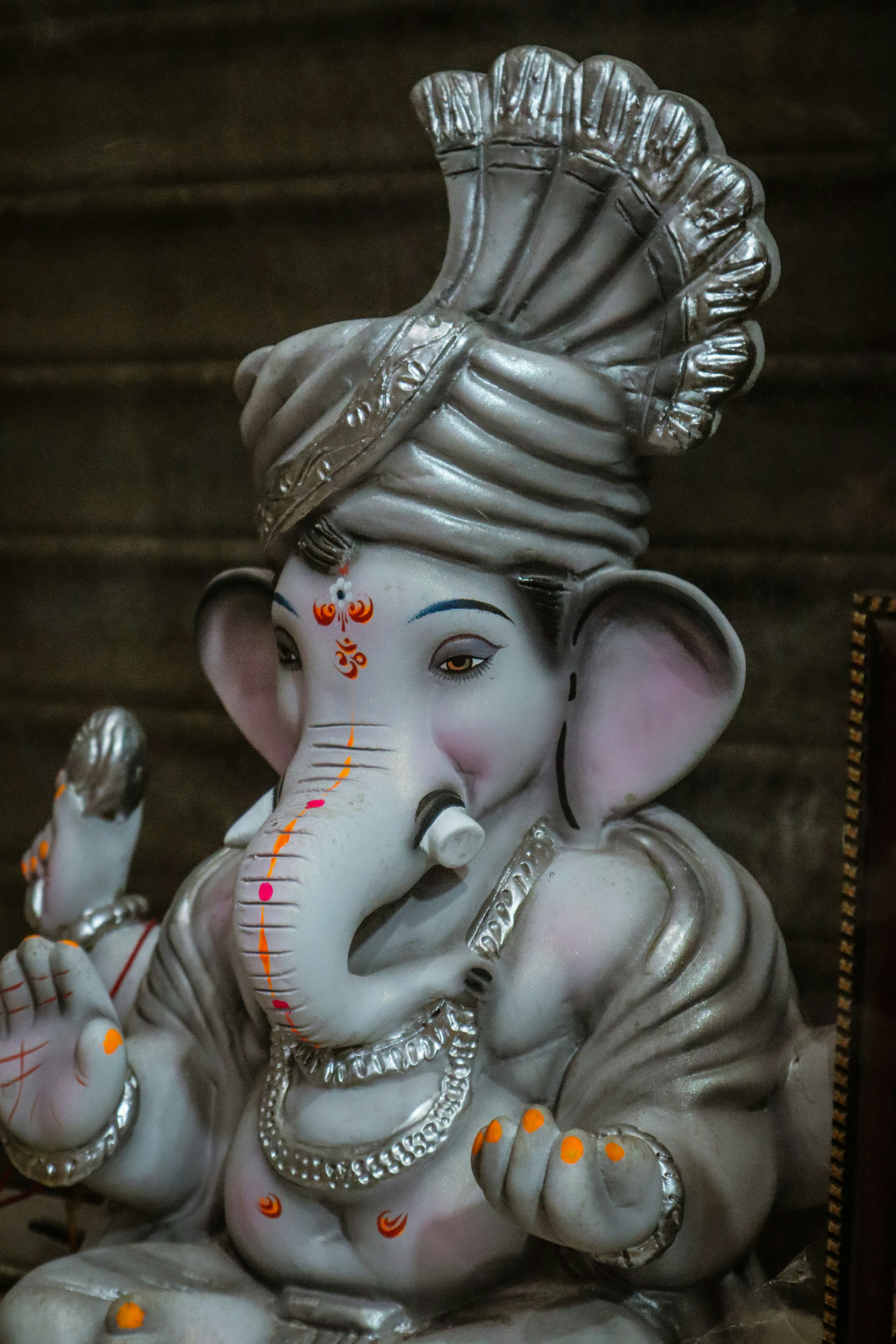 angel holding string lights figurine