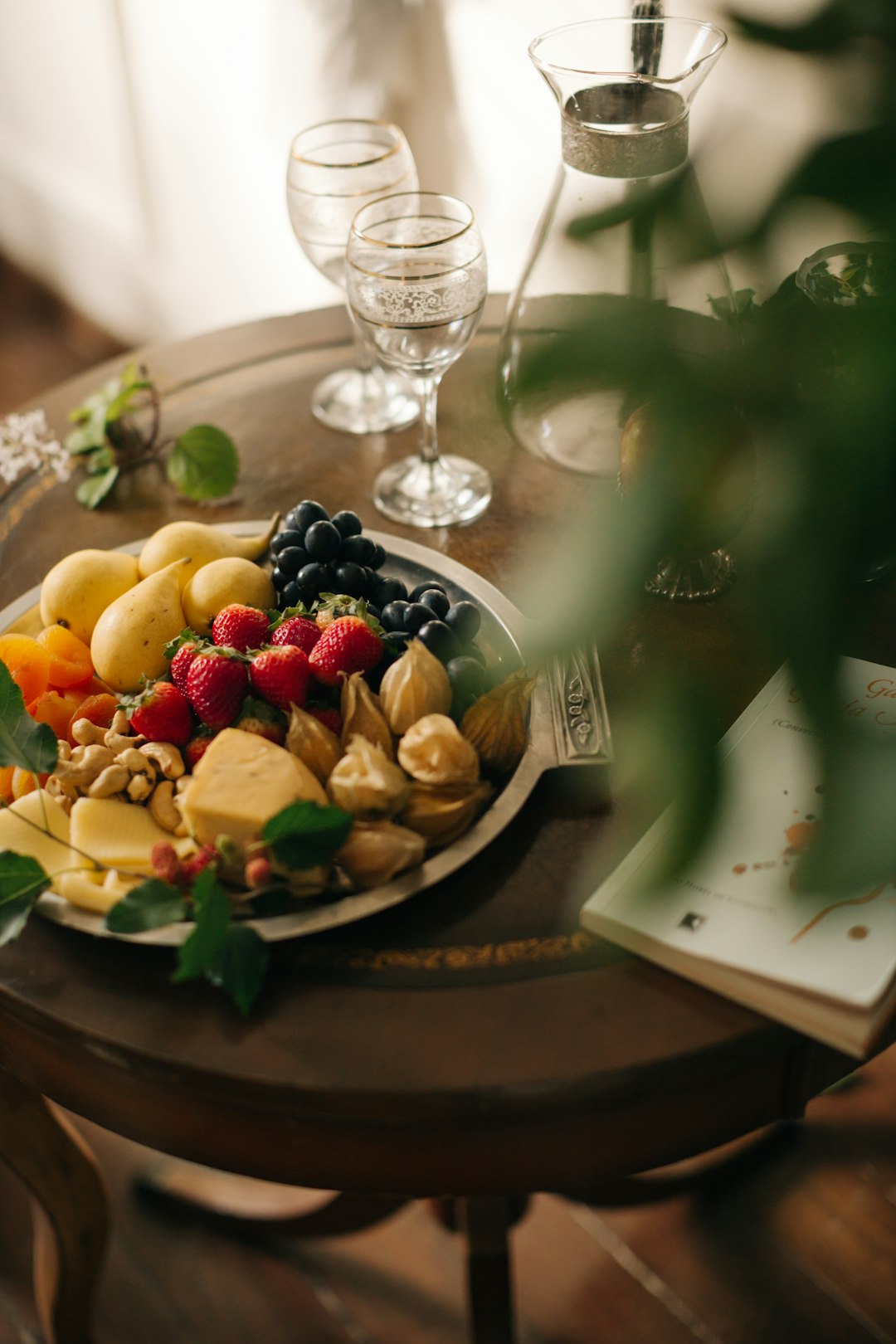 sliced fruits on black ceramic plate