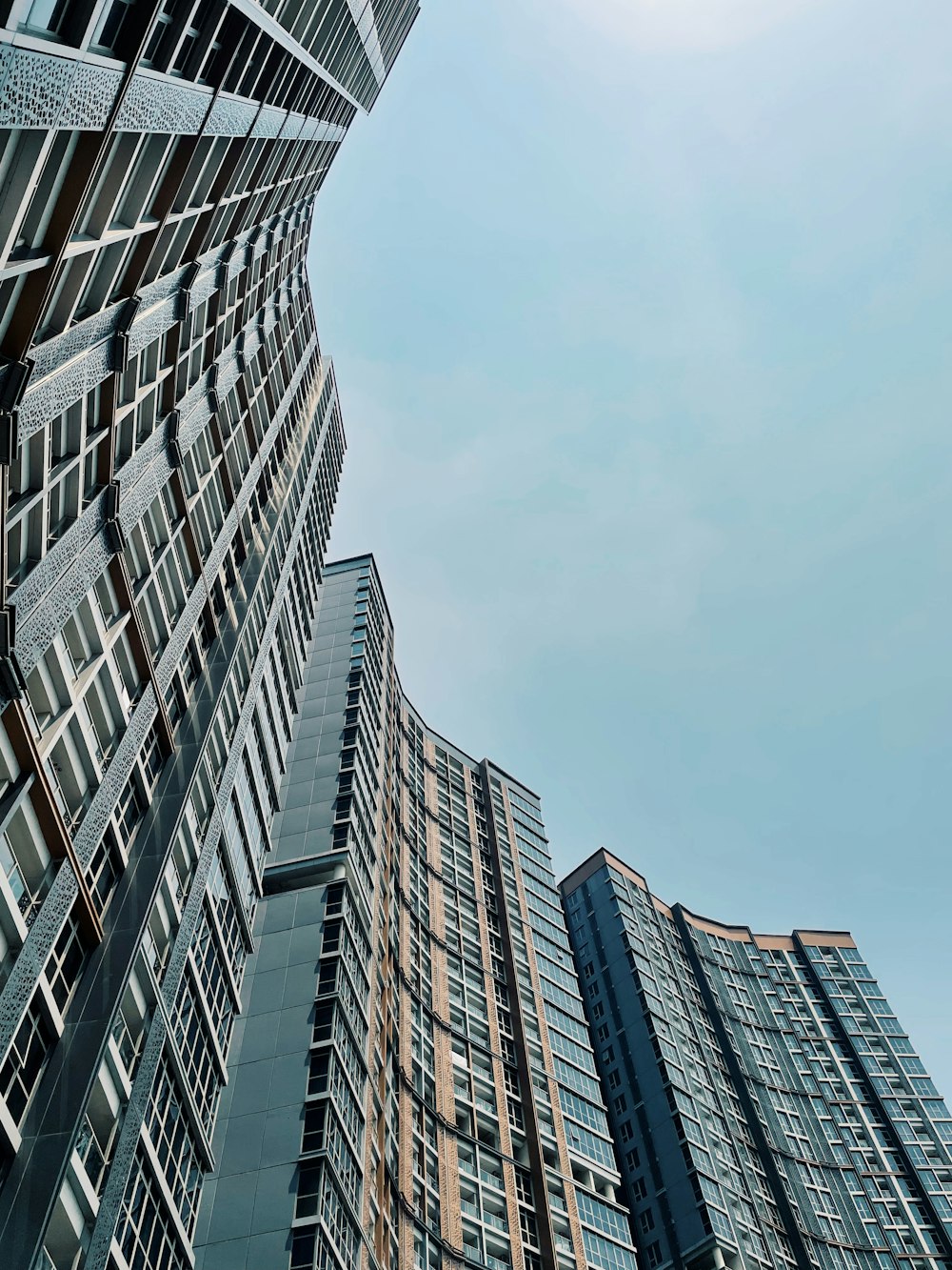 low angle photography of high rise building