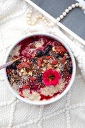 red and black food in white ceramic bowl