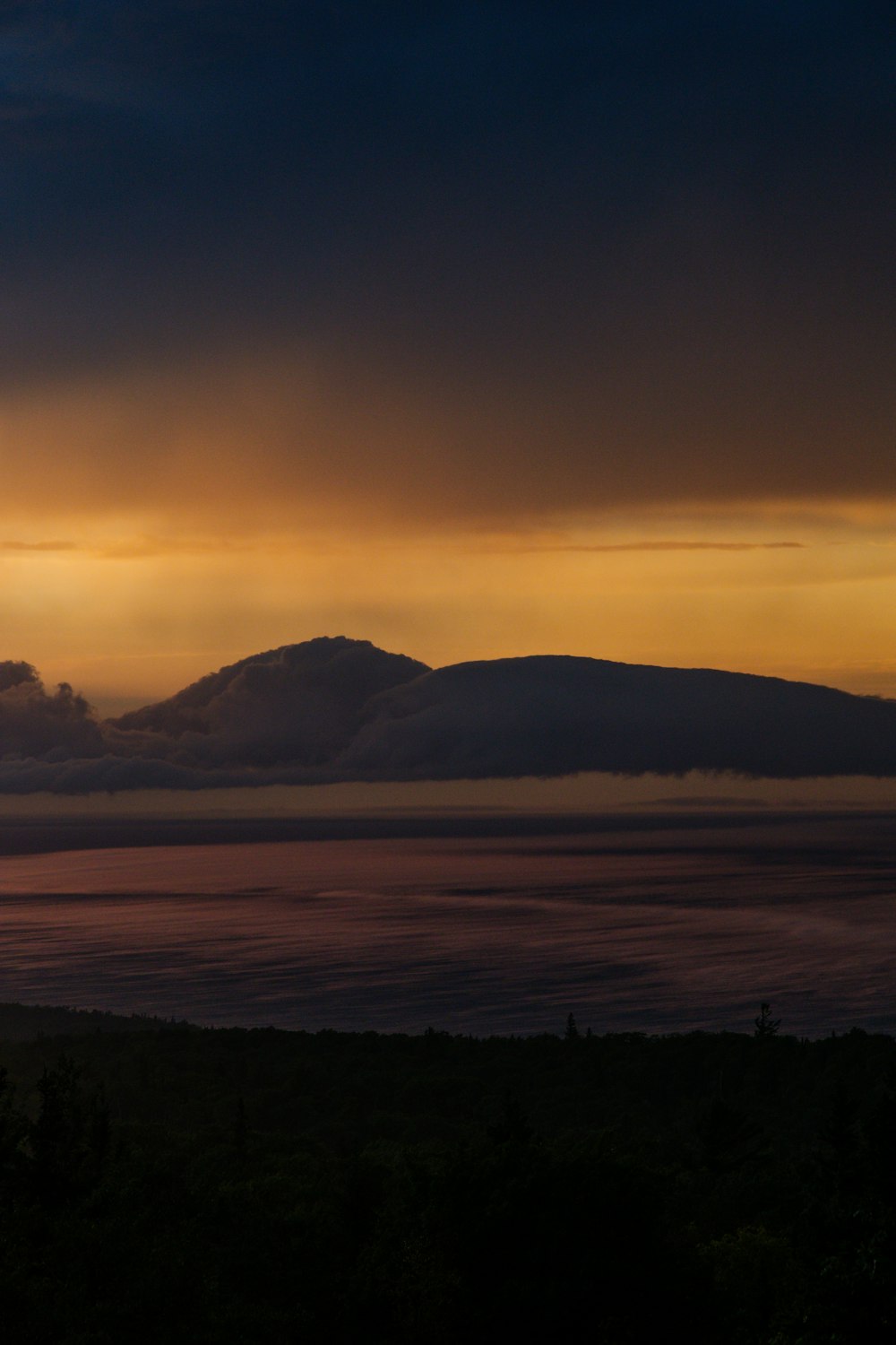 silhouette of mountain during sunset