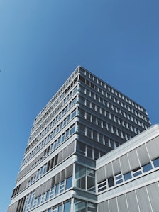 white concrete building under blue sky during daytime