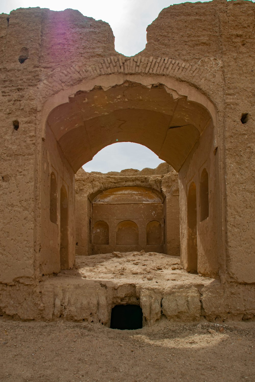 brown concrete arch during daytime