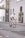 man in white t-shirt riding on bicycle during daytime