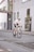 man in white t-shirt riding on bicycle during daytime