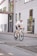 man in white t-shirt riding on bicycle during daytime