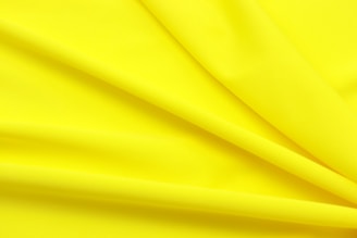 yellow textile in close up photography