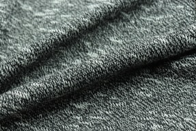 green textile in close up photography