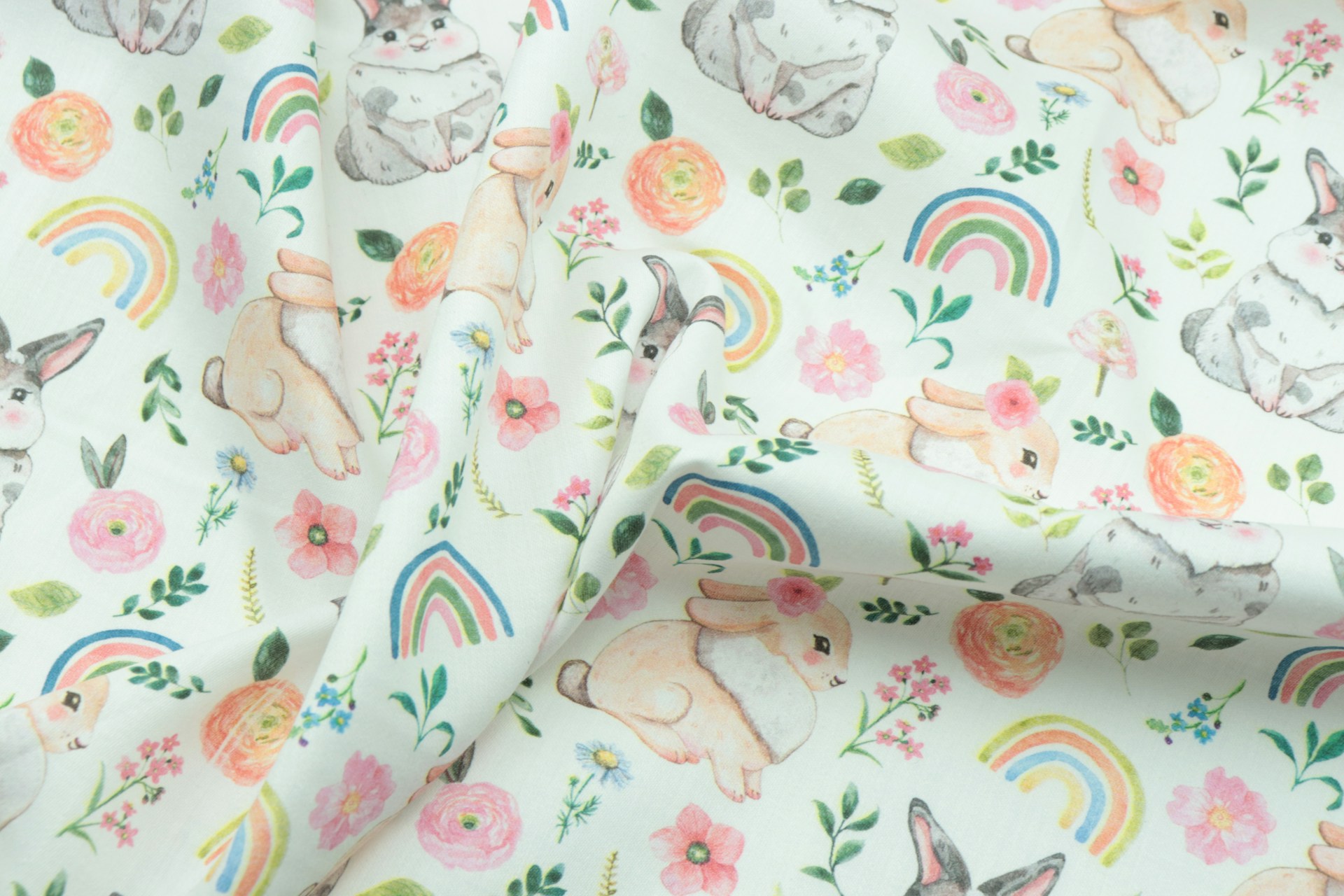 white pink and green floral textile