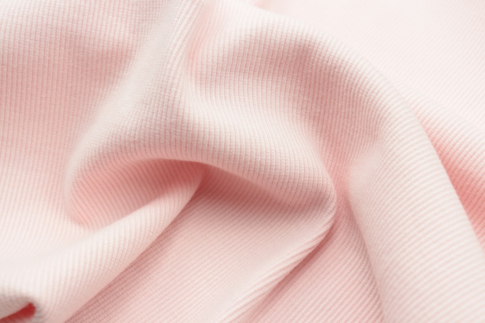 pink textile on white background