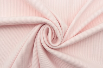 pink textile in close up photography