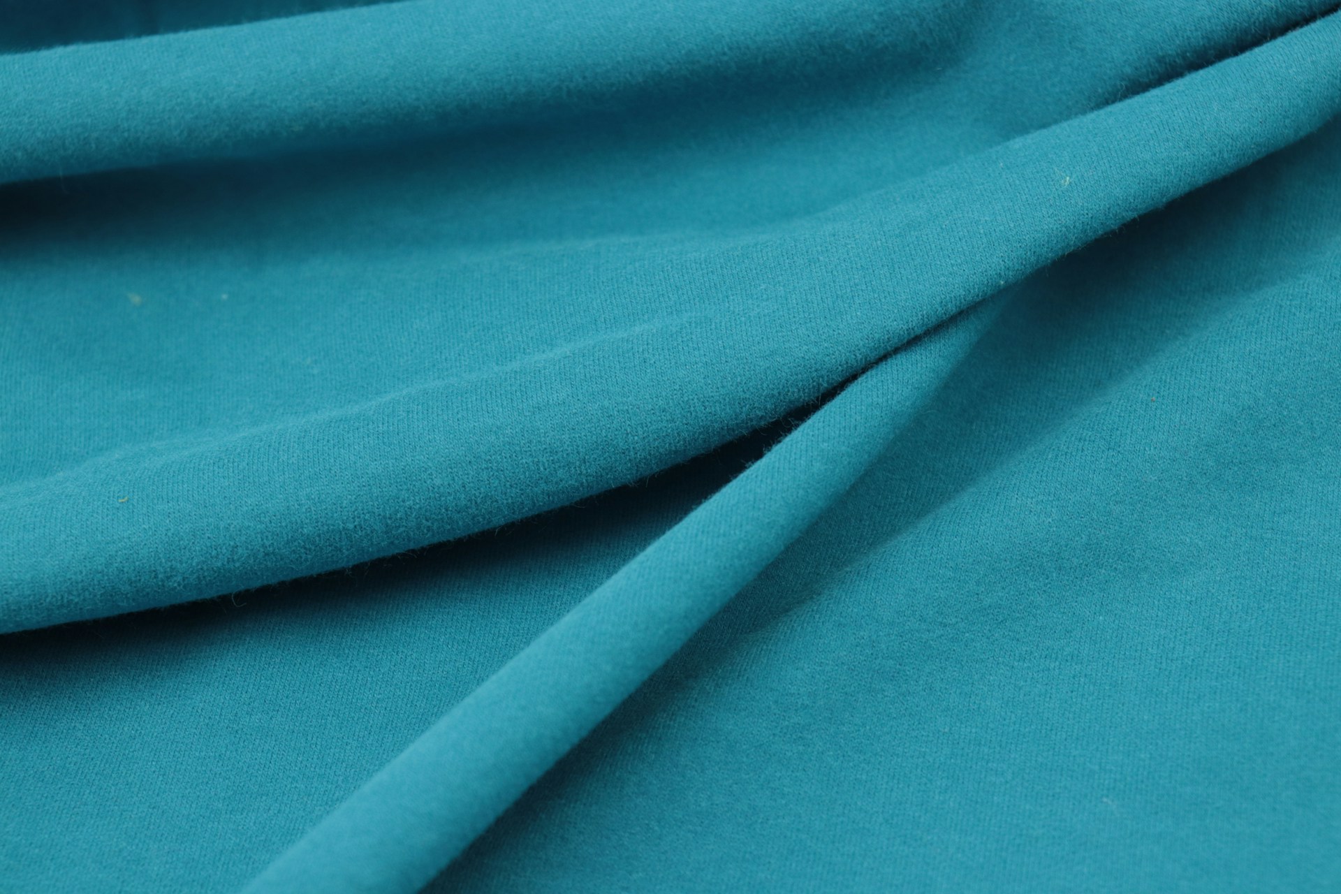 blue textile in close up photography