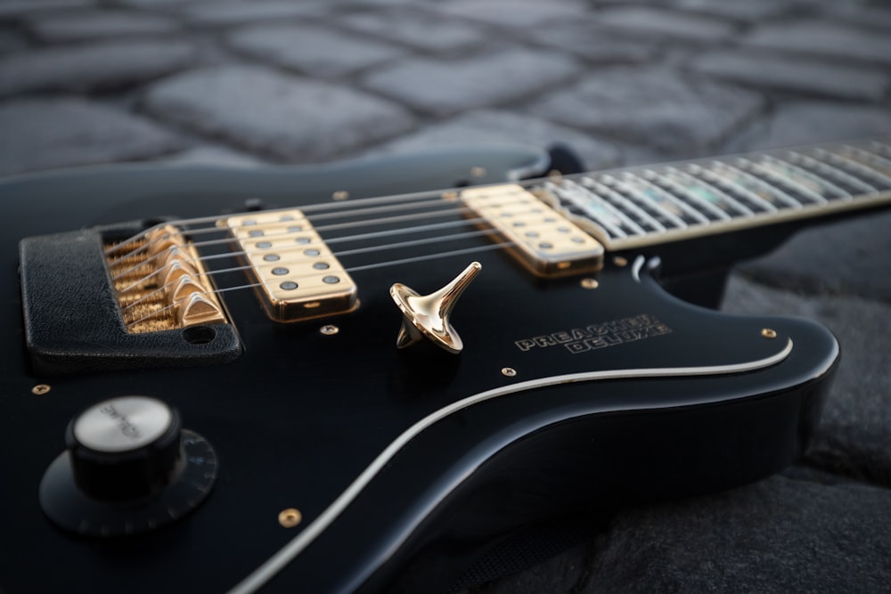 black and white stratocaster electric guitar