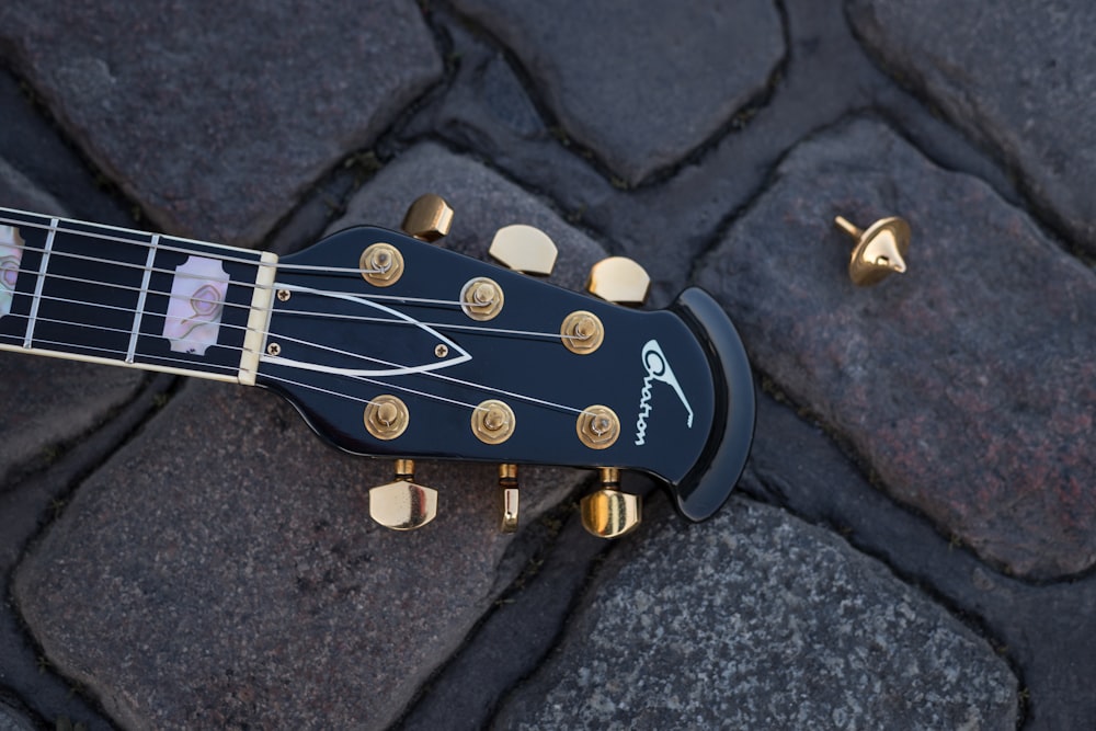 blue and brown acoustic guitar