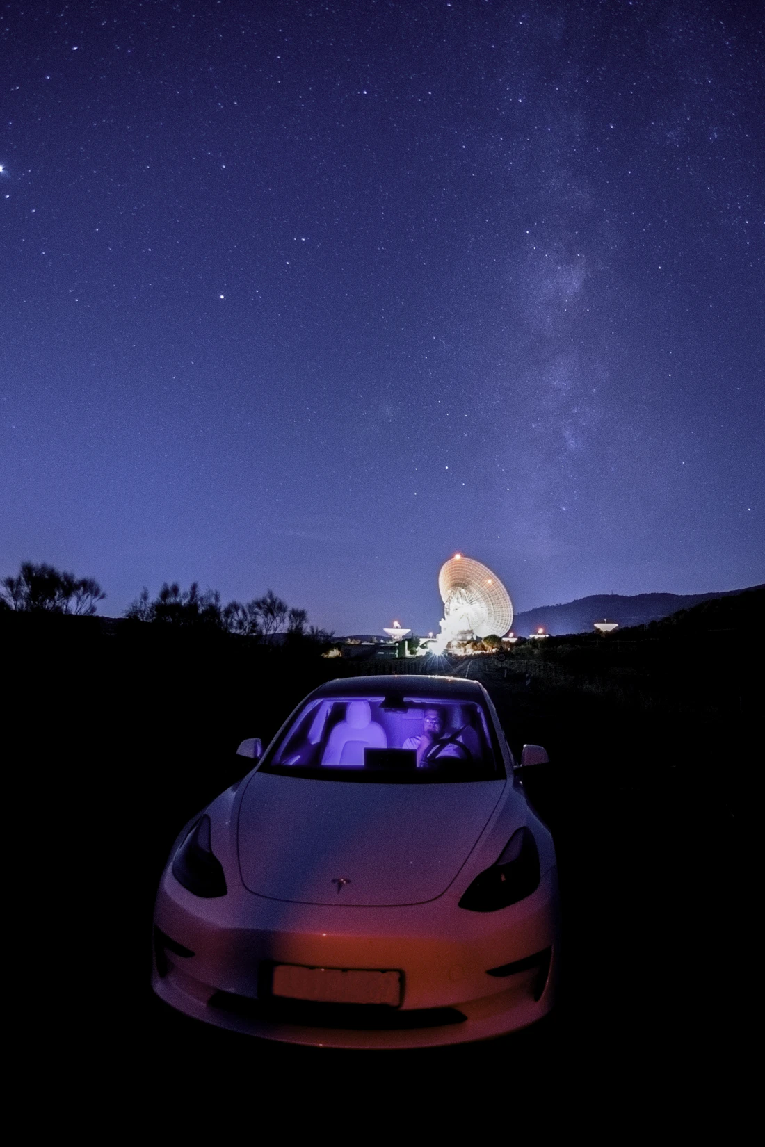 Tesla driving at night