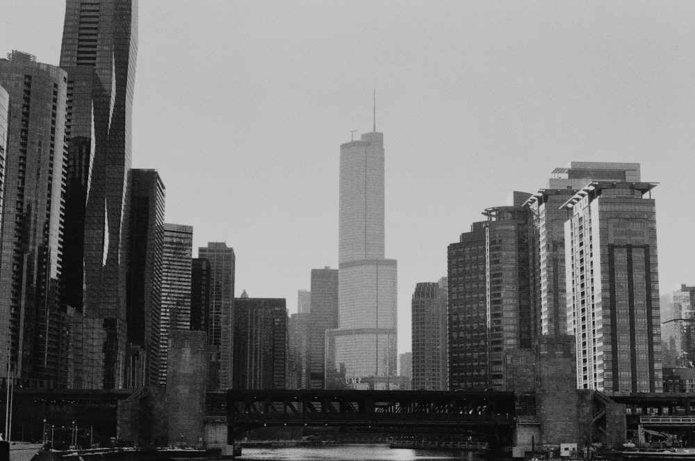 grayscale photo of city buildings