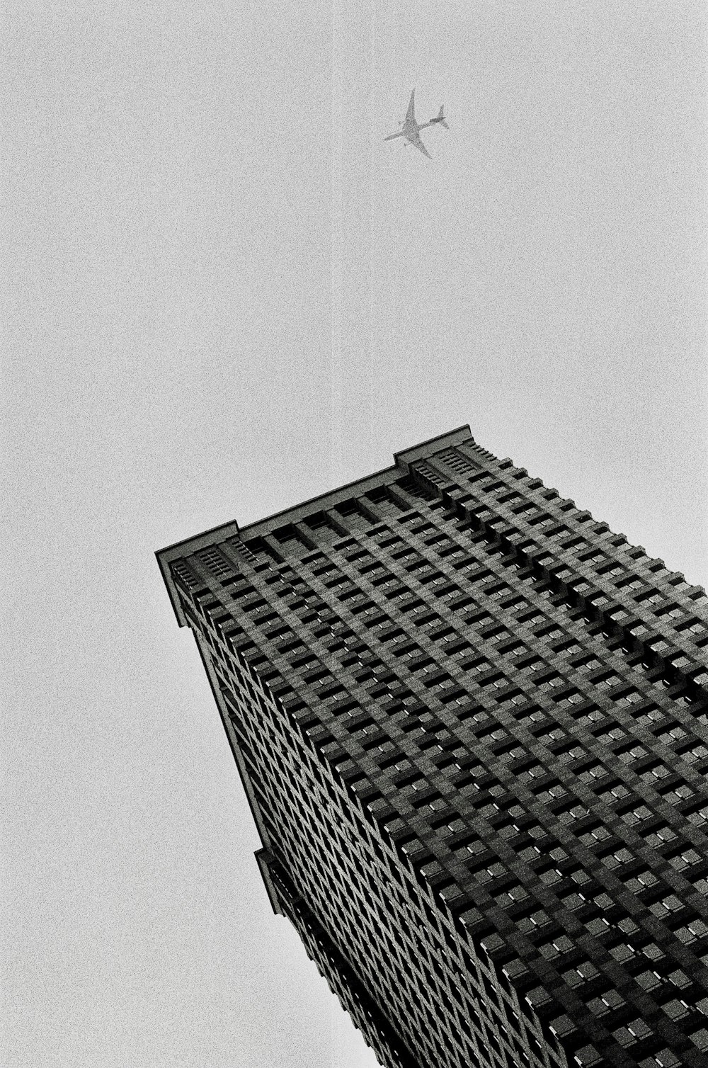 brown concrete building under white sky