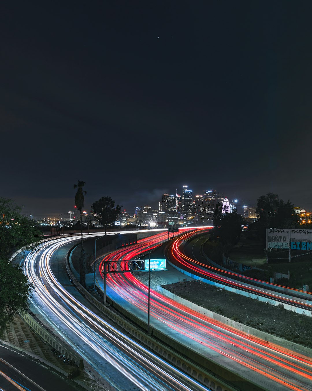 time lapse photography of cars on road during night time