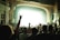Audience cheering enthusiastically during the tribute show.