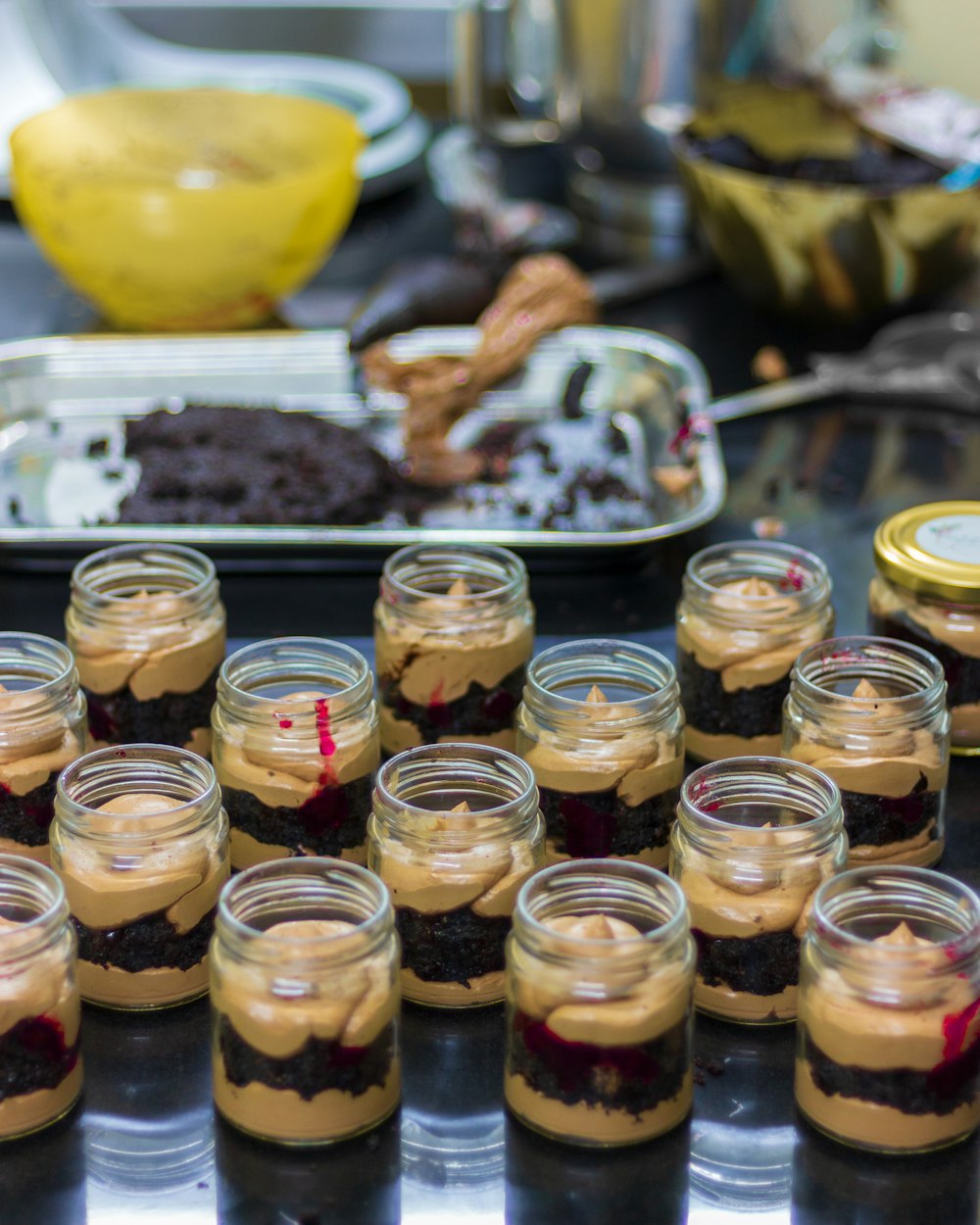 clear drinking glasses with brown liquid